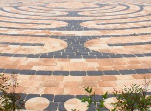 Photo of the brickwork of an outdoor labyrinth