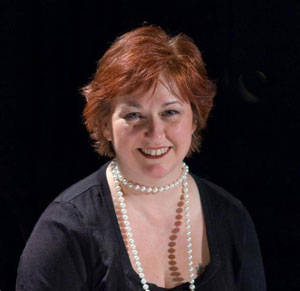 Amy Conley, Music & Arts Director